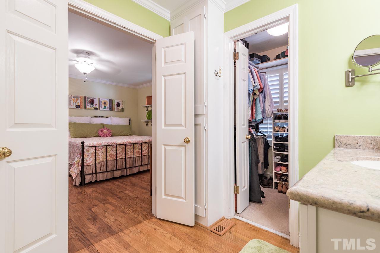 2320 Ridge Road Raleigh, NC 27612 - Photo 17 of 25 a bedroom with a bed and a view of bedroom
