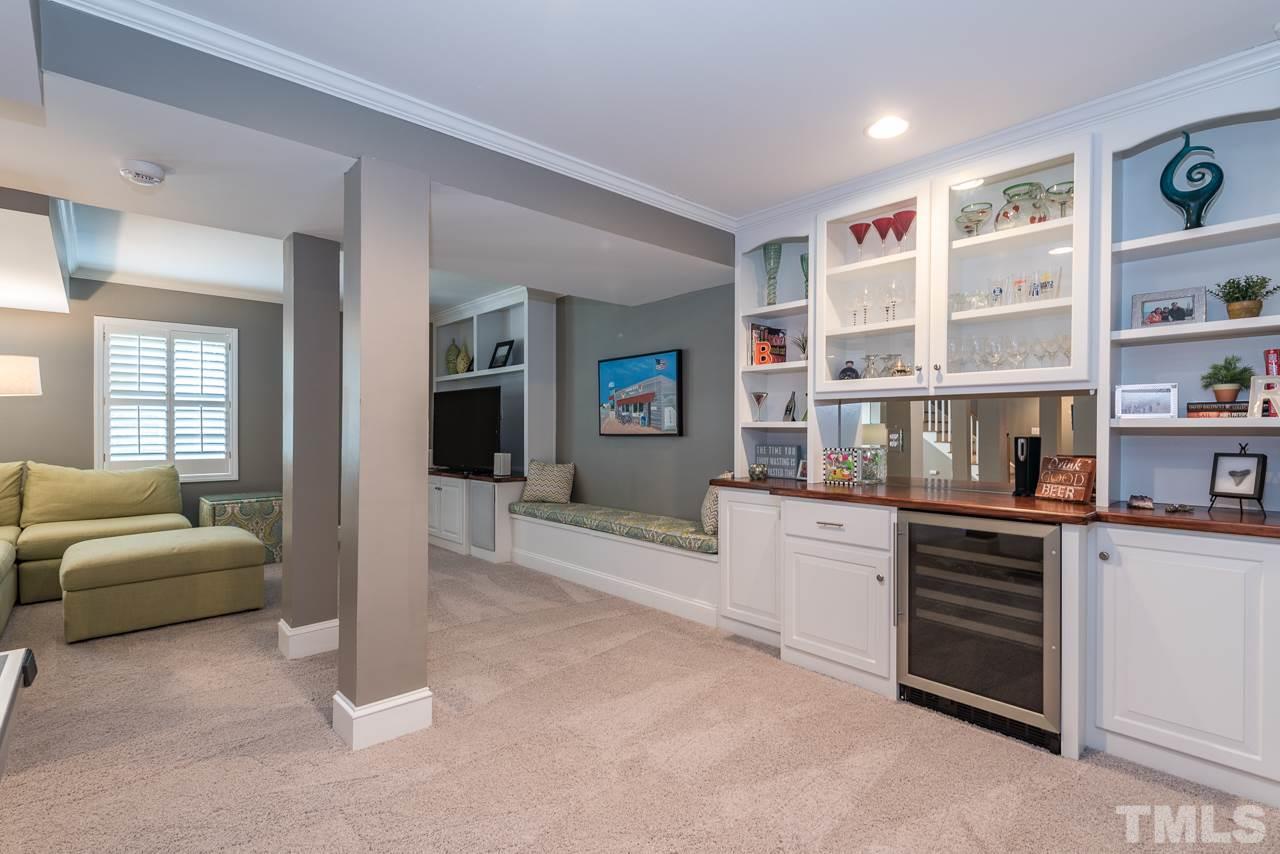 2320 Ridge Road Raleigh, NC 27612 - Photo 20 of 25 a living room with stainless steel appliances furniture and a kitchen view