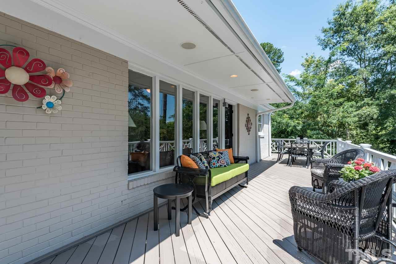 2320 Ridge Road Raleigh, NC 27612 - Photo 23 of 25 a outdoor living space with furniture and garden view