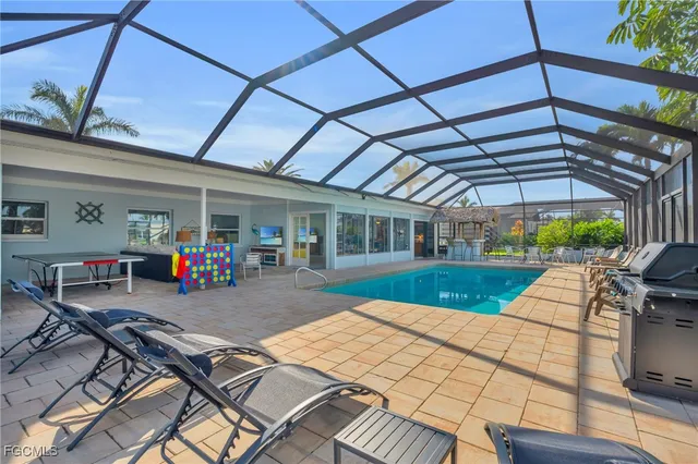 a view of a chairs and tables in patio