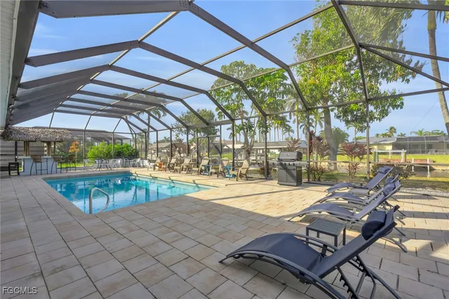 a view of yard with patio