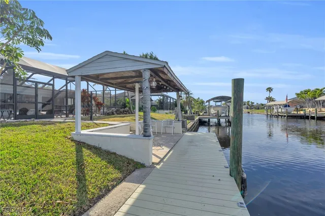 a view of a swimming pool with a patio