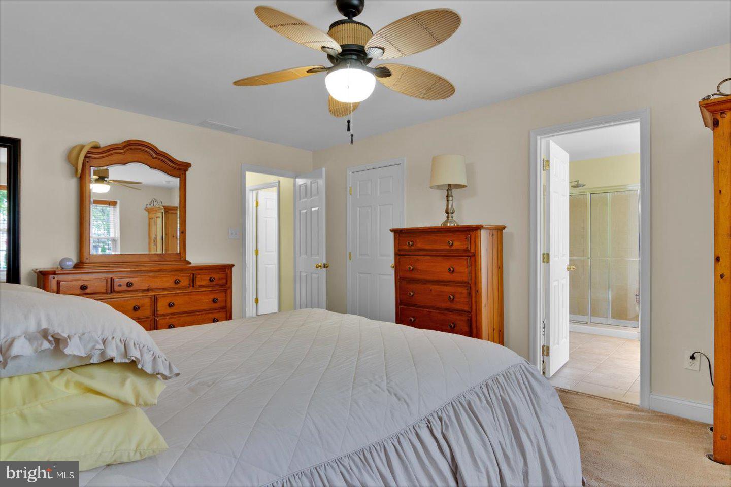 131 Sequoia Drive Berlin, NJ 08009 - Photo 22 of 43 a bedroom with a bed and dresser with mirror