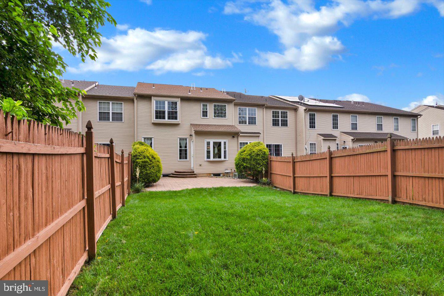 131 Sequoia Drive Berlin, NJ 08009 - Photo 39 of 43 a view of a house with a yard and sitting area