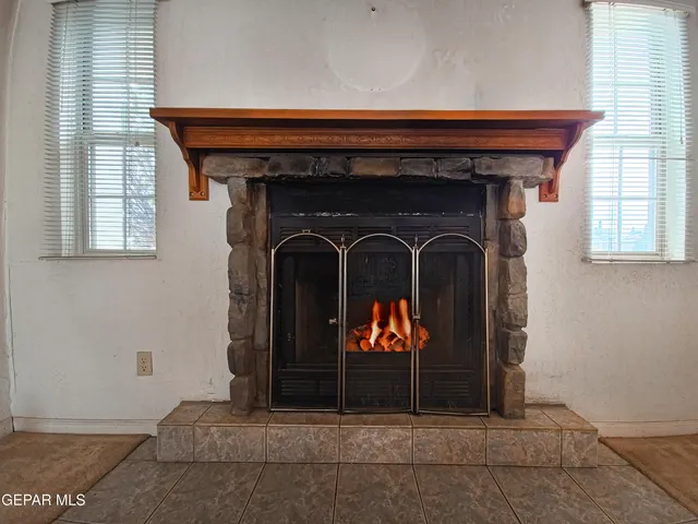a front view of a house with large windows