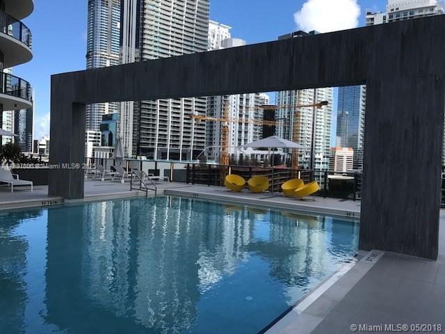 55 Southwest 9th Street, Unit 2510 Miami, FL 33130 - Photo 13 of 27 a view of swimming pool with outdoor seating