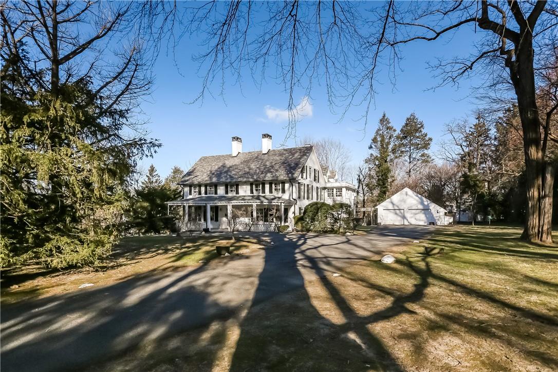 31 Mamaroneck Road Scarsdale, NY 10583 - Photo 1 of 1 Farmhouse colonial set back and screened from the road with large circular driveway, detached 2 car garage, plenty of parking for guests