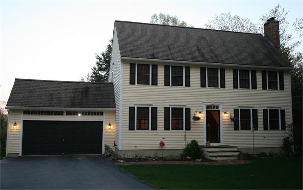 25 Polly Road Holland, MA 01521 - Photo 1 of 30 a front view of a house with a yard