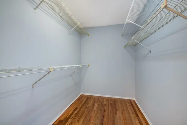 a view of a room with racks on the wall
