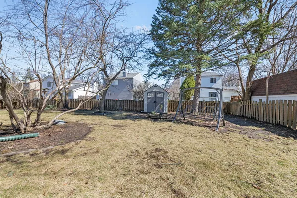 a house with trees in front of it