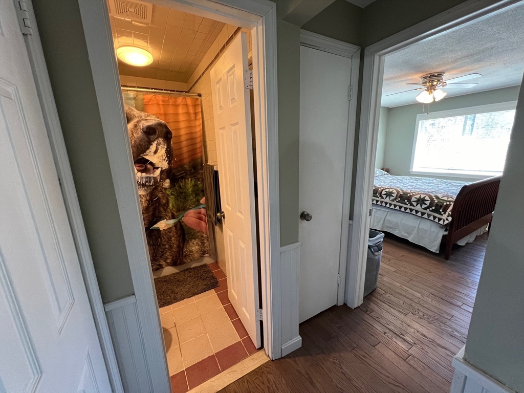 5 Turnpike Road, Unit 233 Townsend, MA 01469 - Photo 11 of 16 a view of a hallway and a livingroom with furniture