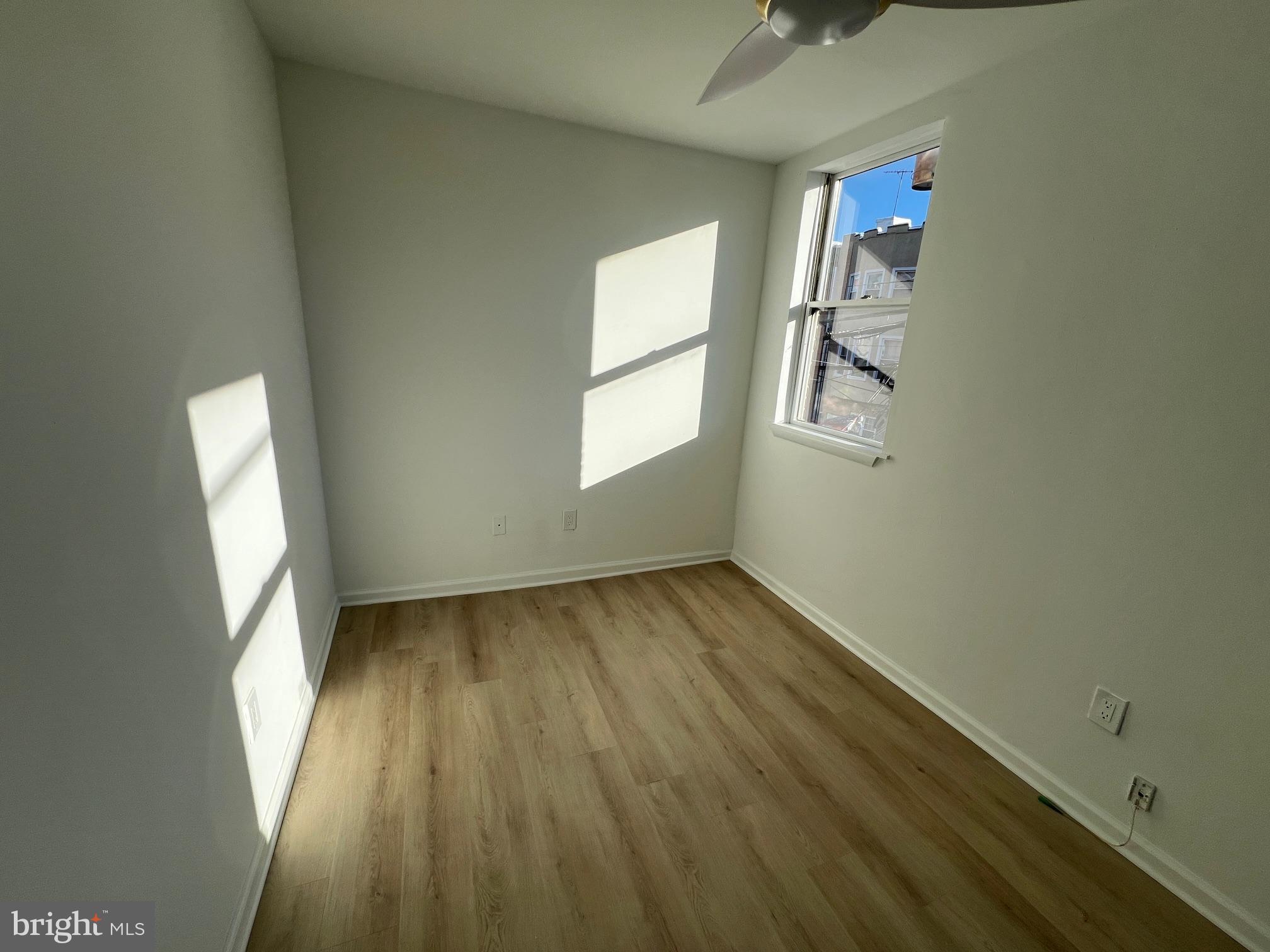 626 South 8th Street, Unit 2 Philadelphia, PA 19147 - Photo 13 of 14 an empty room with windows