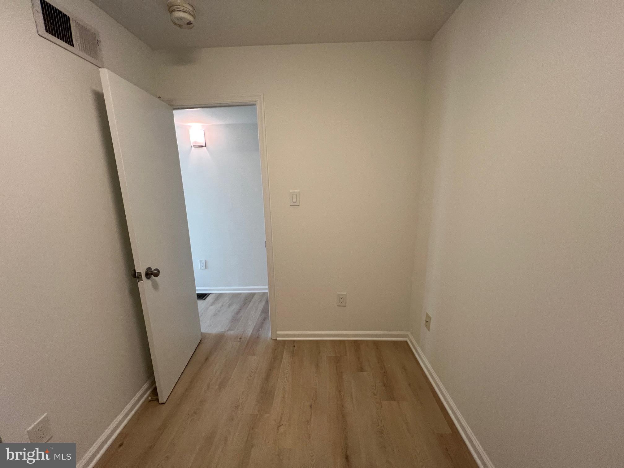 626 South 8th Street, Unit 2 Philadelphia, PA 19147 - Photo 10 of 14 wooden floor in a empty room