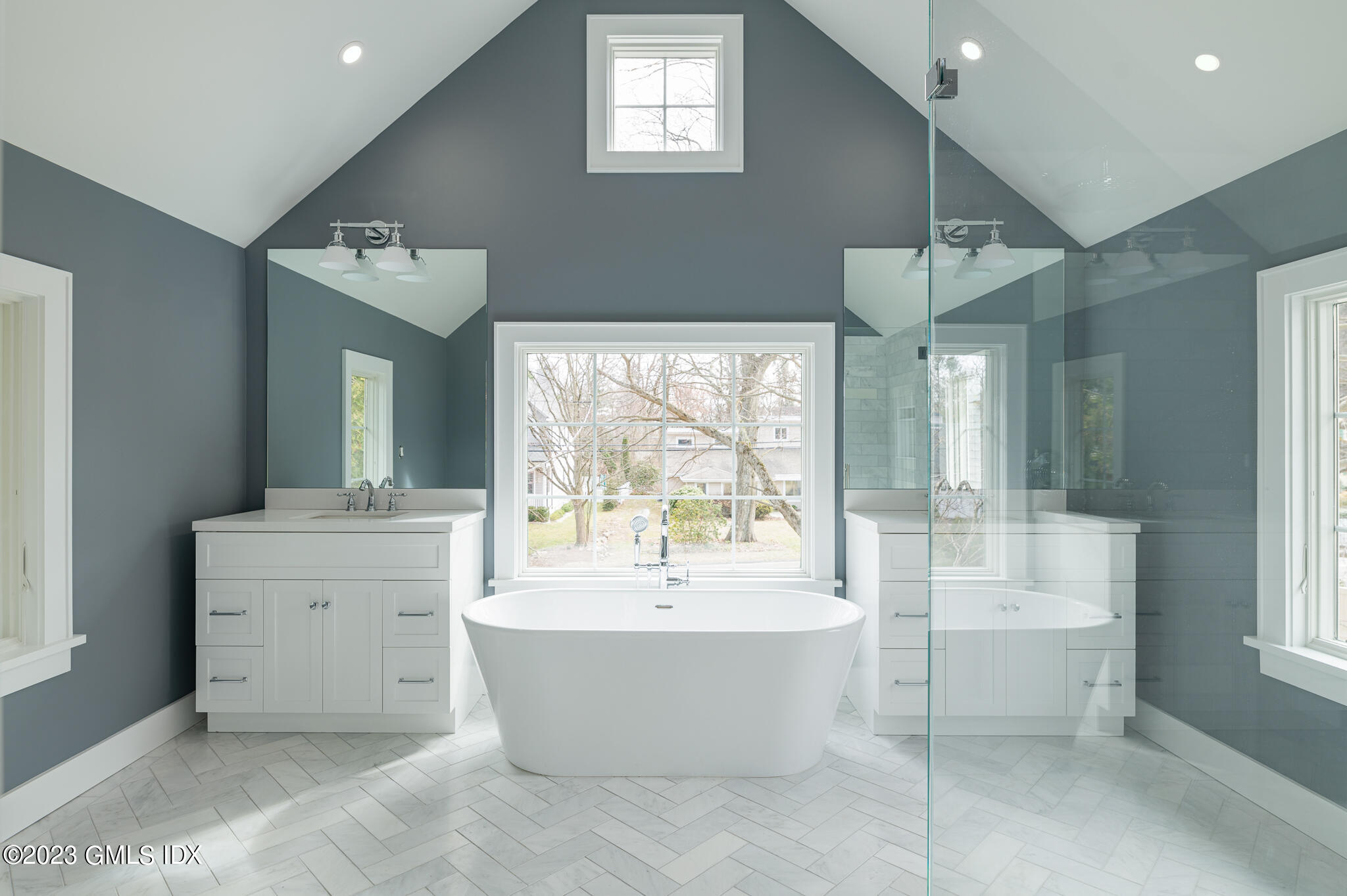 27 Summit Road Riverside, CT 06878 - Photo 19 of 38 a large spacious bathroom with a large tub and sink