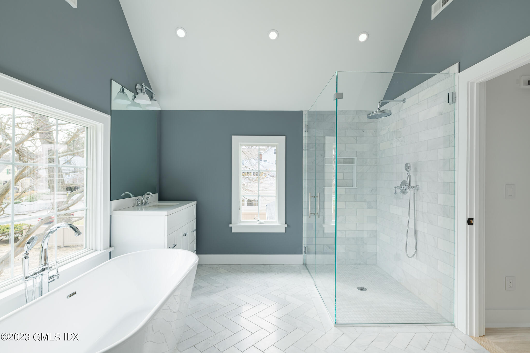 27 Summit Road Riverside, CT 06878 - Photo 20 of 38 a bathroom with a tub shower and sink