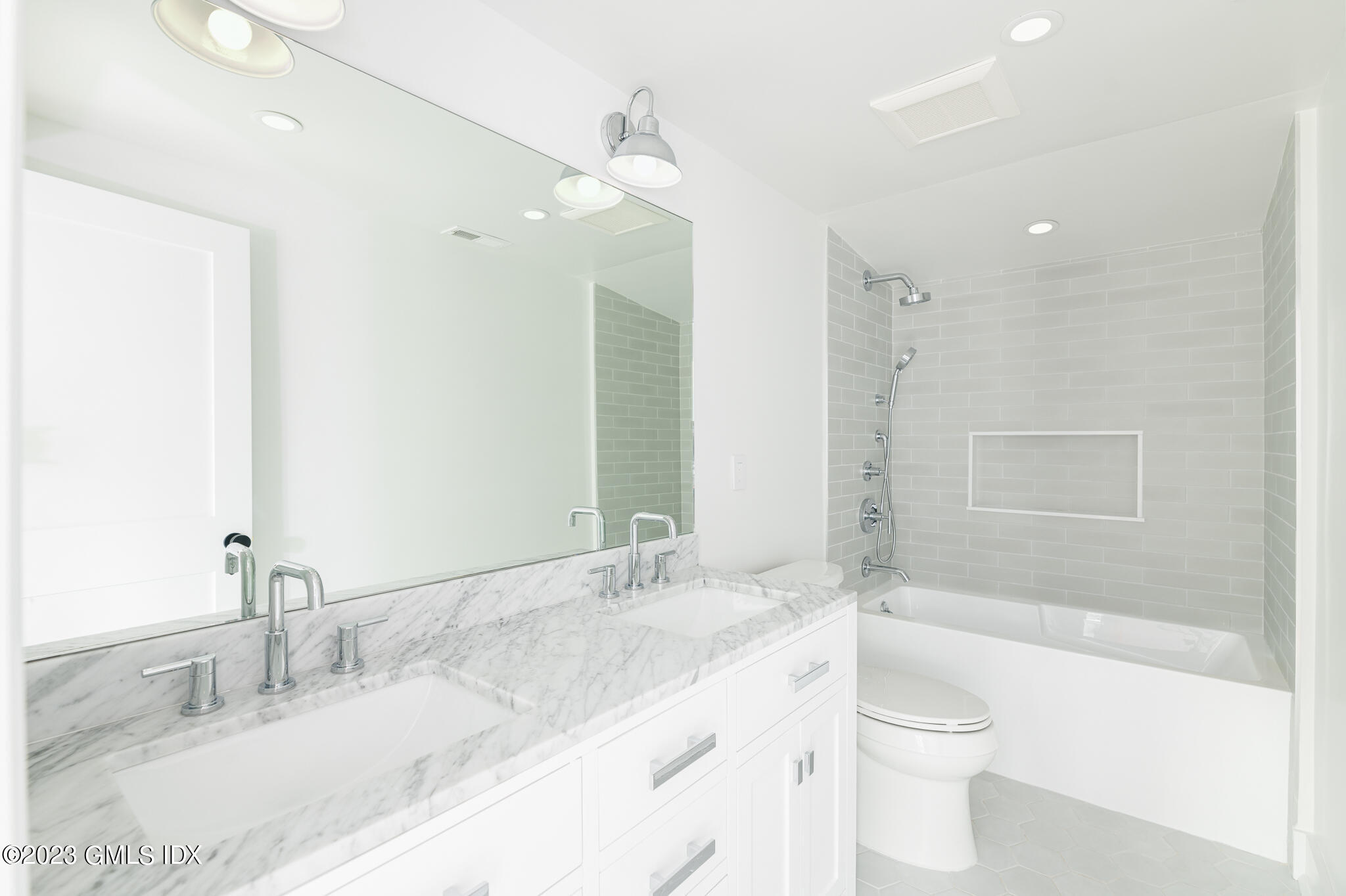 27 Summit Road Riverside, CT 06878 - Photo 24 of 38 a bathroom with a granite countertop sink a toilet and shower