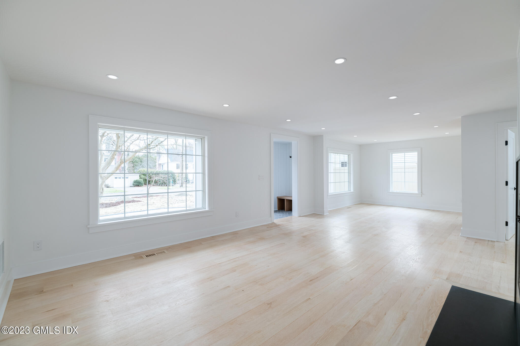 27 Summit Road Riverside, CT 06878 - Photo 3 of 38 an empty room with windows and entrance