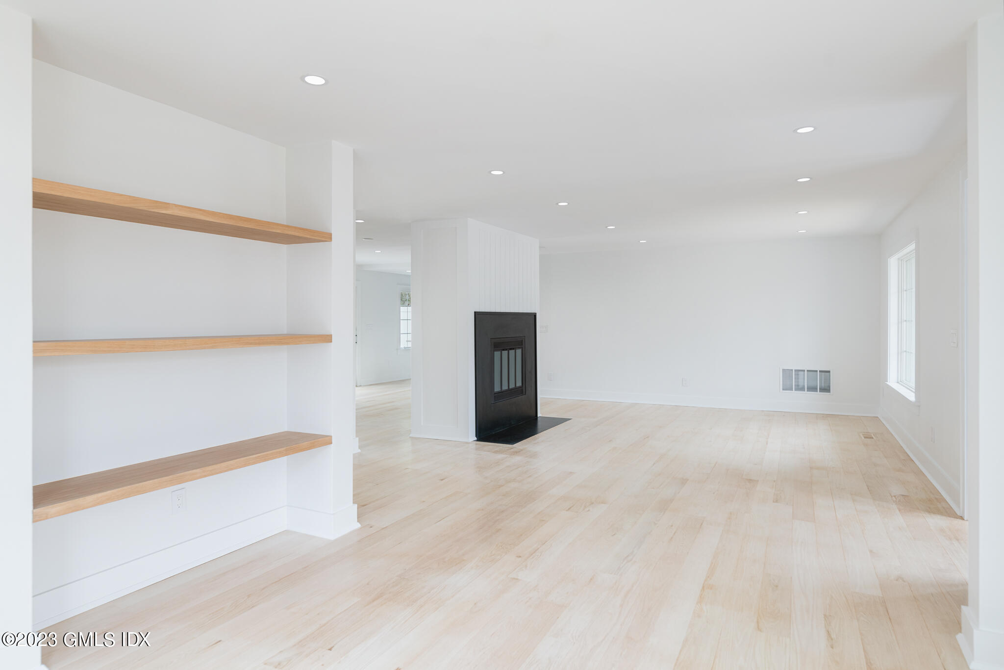 27 Summit Road Riverside, CT 06878 - Photo 4 of 38 a view of an empty room with wooden floor