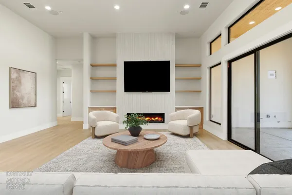 a kitchen with a table chairs sink and stove