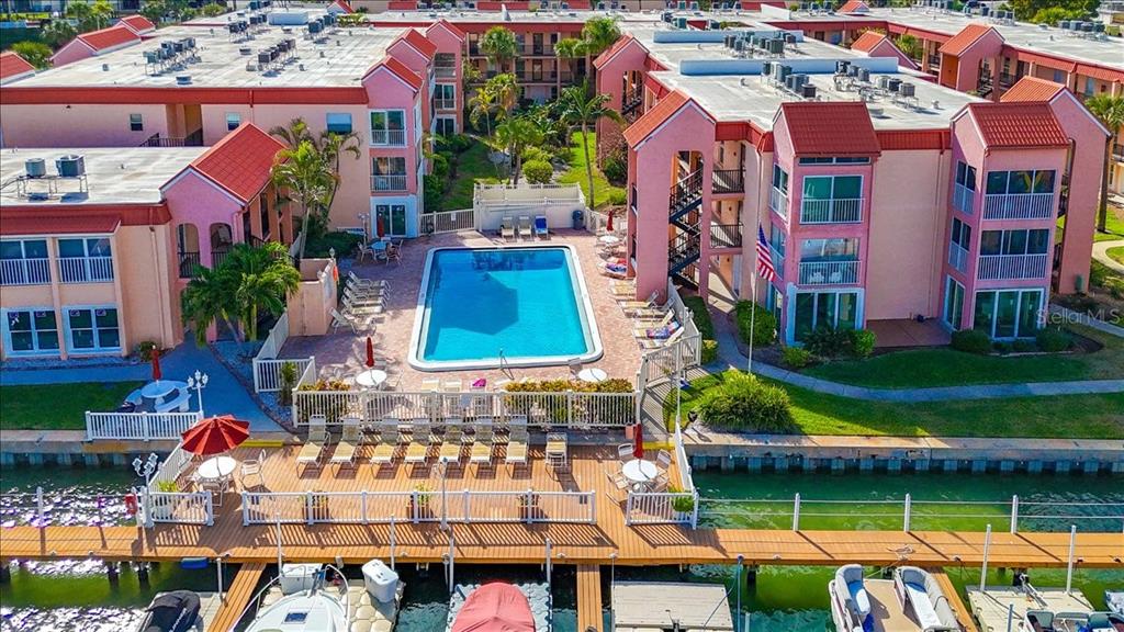an aerial view of houses with yard