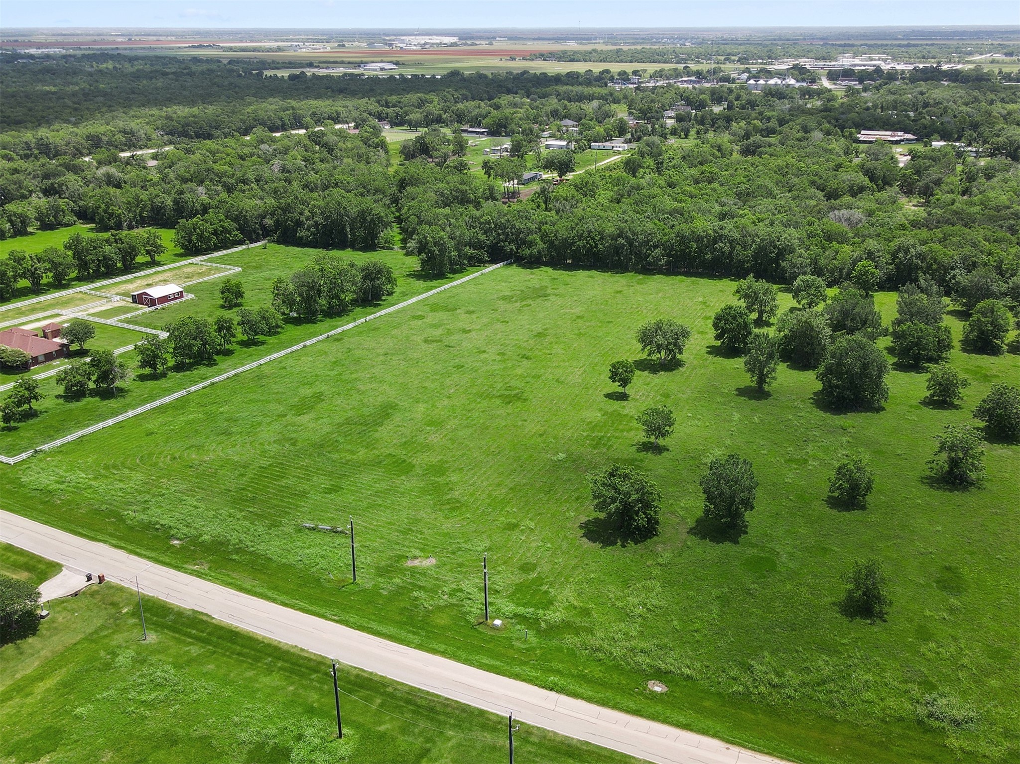 16403 Sun Valley Lane Rosharon, TX 77583 - Photo 6 of 15 a view of a field with a mountain in the background