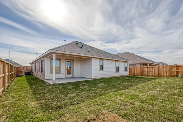 a view of an empty space with a lake view
