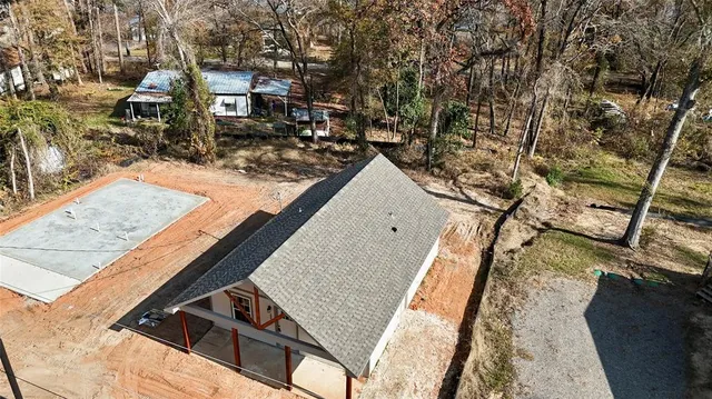 a view of roof deck with patio