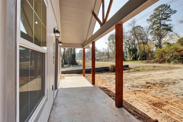 a house with trees in the background
