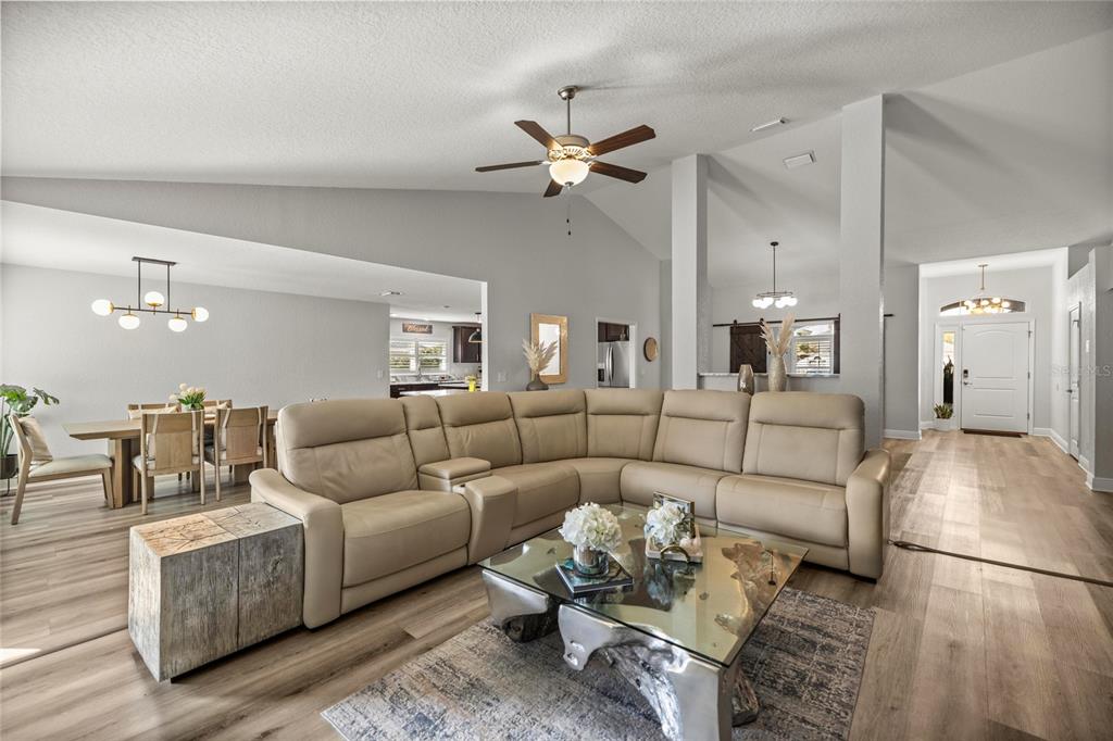 4160 Southwest 100th Street Ocala, FL 34476 - Photo 15 of 42 a living room with furniture and a ceiling fan
