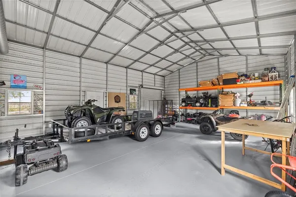 a view of a garage with parked cars