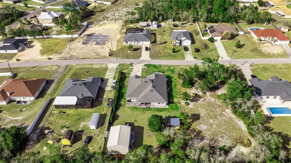 4160 Southwest 100th Street Ocala, FL 34476 - Photo 9 of 42 an aerial view of residential houses with outdoor space