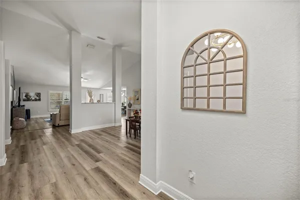 a view of livingroom with furniture and wooden floor