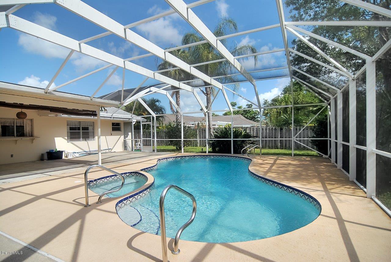 581 Ne Port Palm Bay, FL 32905 - Photo 2 of 14 pool south (2)