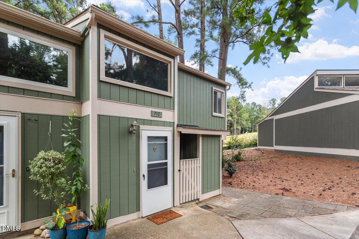 712 Godwin Court Raleigh, NC 27606 - Photo 23 of 27 a view of a house with a yard