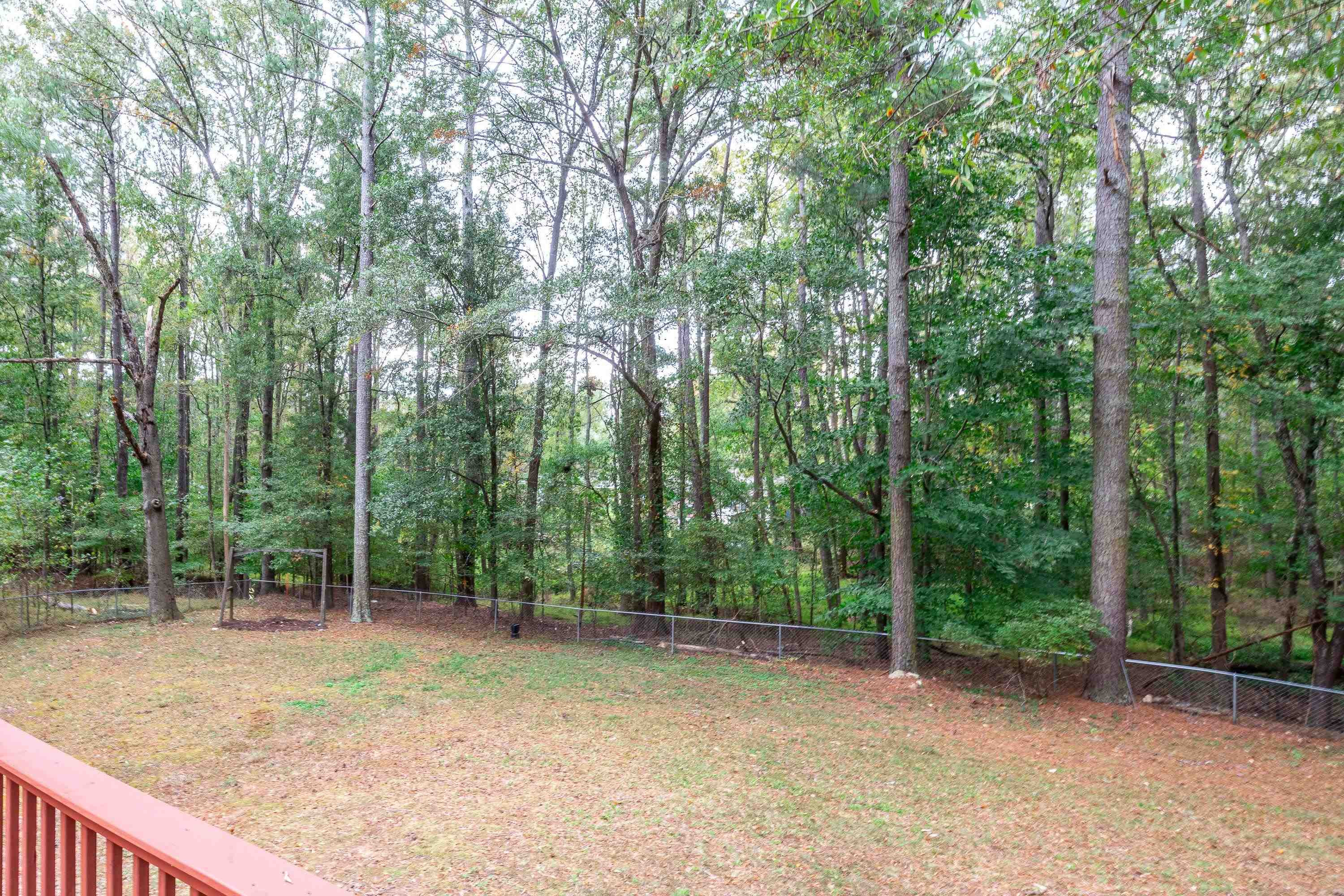 252 Hester Road Durham, NC 27703 - Photo 26 of 55 Deck overlooking back yard and natural area.