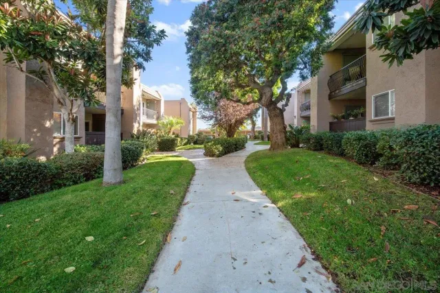 a view of a building with a yard