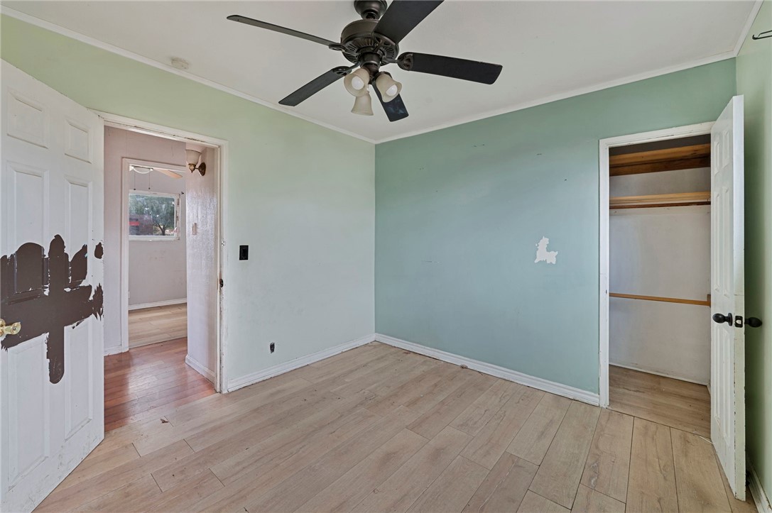15364 Naranja Avenue Paramount, CA 90723 - Photo 14 of 28 wooden floor in an empty room