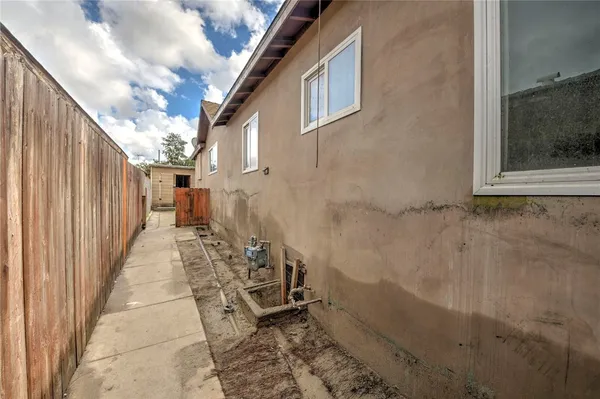 a view of a pathway with a patio