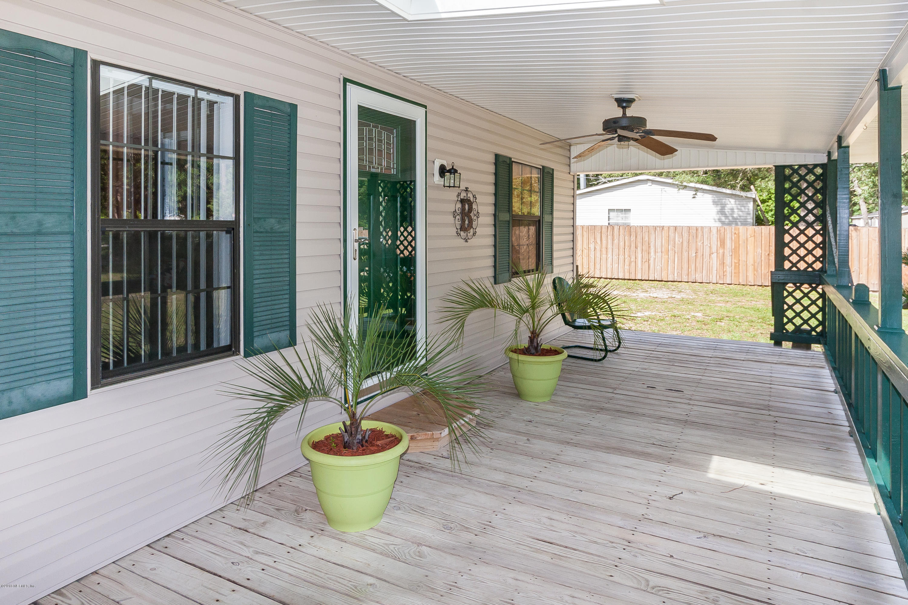 85468 Haddock Road Yulee, FL 32097 - Photo 11 of 49 front porch