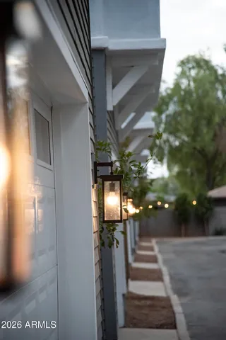 a view of a livingroom with furniture and entryway