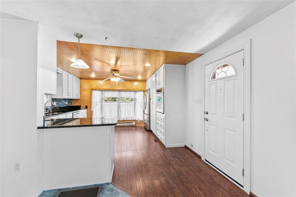 1017 Nellie Road Vanderbilt, PA 15486 - Photo 13 of 31 a view of a big room with wooden floor and a window