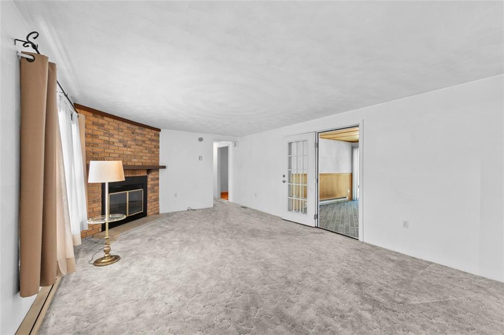 1017 Nellie Road Vanderbilt, PA 15486 - Photo 18 of 31 a view of a livingroom with a staircase