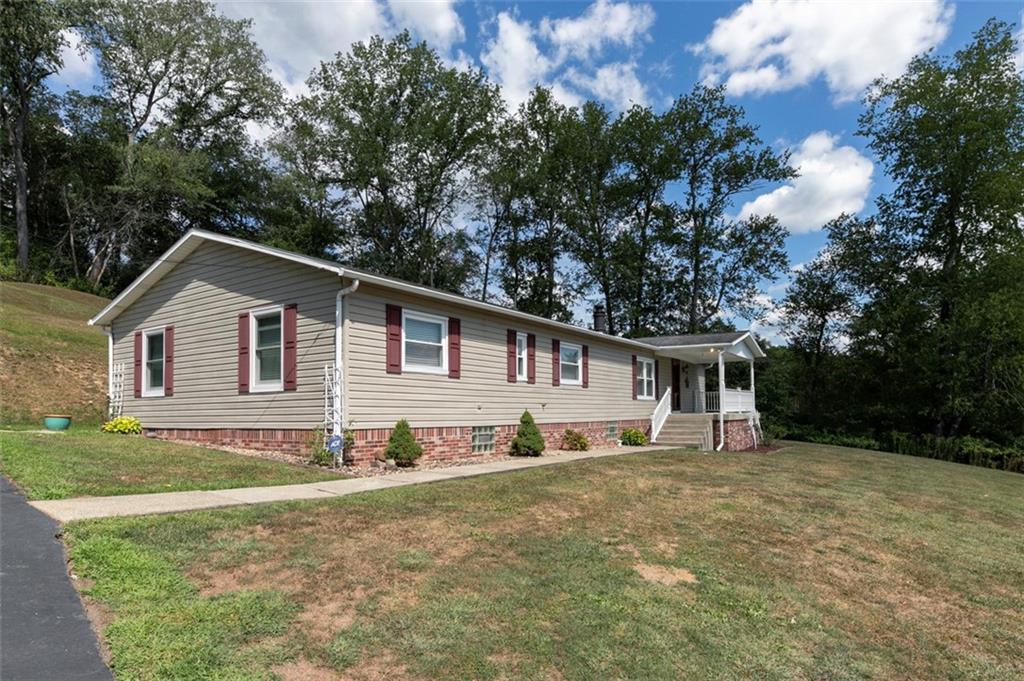 1017 Nellie Road Vanderbilt, PA 15486 - Photo 2 of 31 a view of house outdoor space and yard