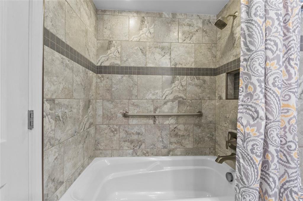 1017 Nellie Road Vanderbilt, PA 15486 - Photo 28 of 31 a bathroom with a bathtub