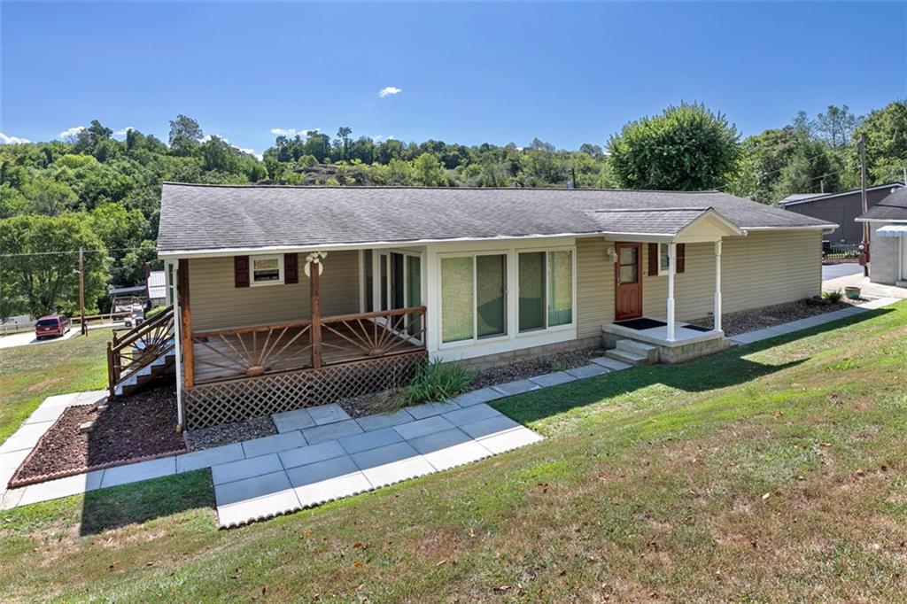 1017 Nellie Road Vanderbilt, PA 15486 - Photo 7 of 31 a view of a house with a patio