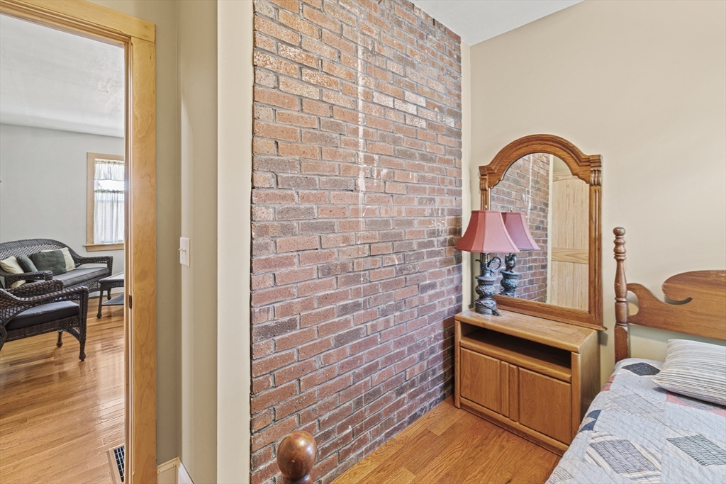 5 Meade Street Wareham, MA 02571 - Photo 16 of 21 a room with furniture and wooden floor