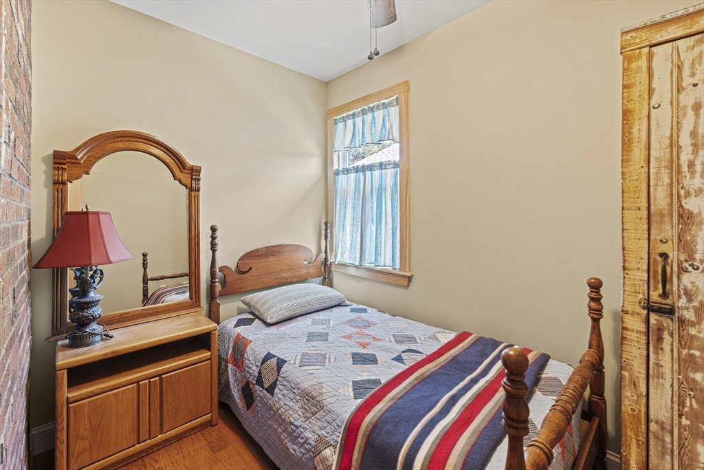 5 Meade Street Wareham, MA 02571 - Photo 17 of 21 a bedroom with a bed and a window
