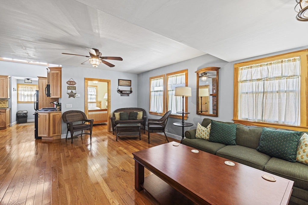 5 Meade Street Wareham, MA 02571 - Photo 4 of 21 a living room with furniture and wooden floor