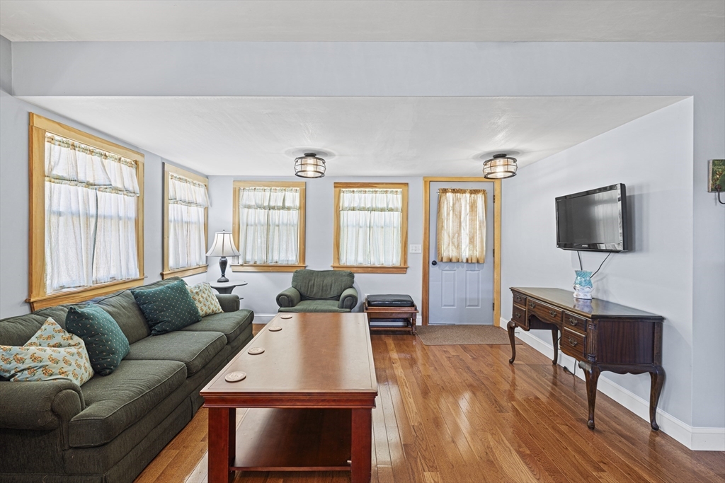 5 Meade Street Wareham, MA 02571 - Photo 5 of 21 a living room with furniture and a flat screen tv