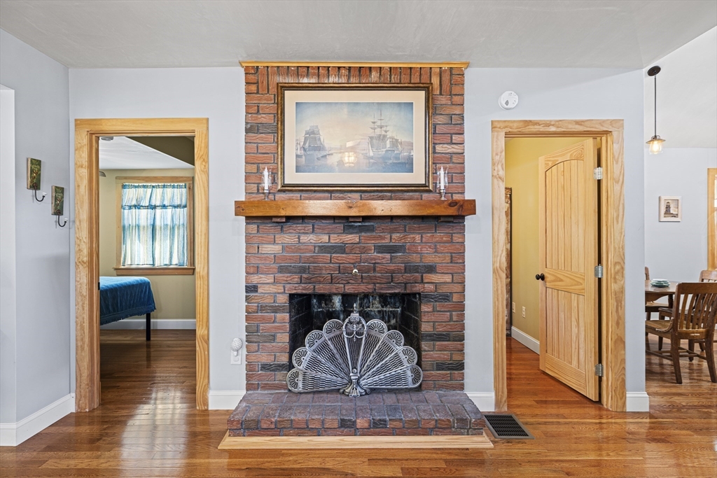 5 Meade Street Wareham, MA 02571 - Photo 6 of 21 a living room with furniture and a fireplace